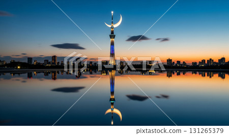 Skytree and the moon reflected on the mirror-like surface of the water Skytree and the moon reflected on the mirror-like surface of the water 131265379
