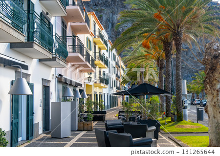 View of Ponta do Sol, a small touristic village in the city of Funchal, main avenue facing the sea, with residential buildings, Madeira Island, Portugal 131265644