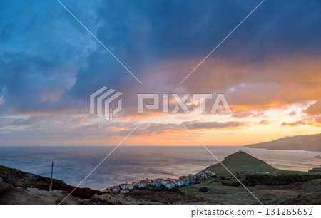 Sunset on Ponta de Sao Lourenco peninsula with small traditional village. Madeira Island Portugal. Sunset on Ponta de Sao Lourenco peninsula with small traditional village. Madeira Island Portugal. 131265652
