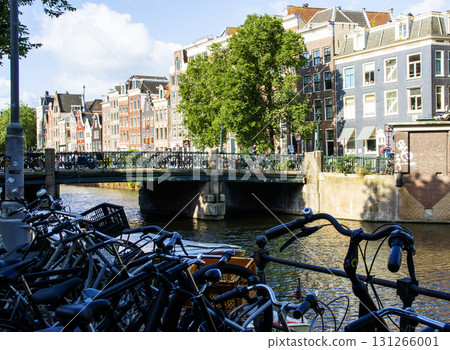 Bicycles Lined by a Canal in a Picturesque Neighborhood in Amsterdam 131266001