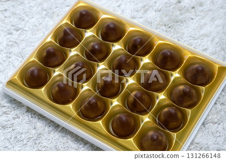 Box of chocolates sweets, close-up top view. Chocolate candy set. 131266148