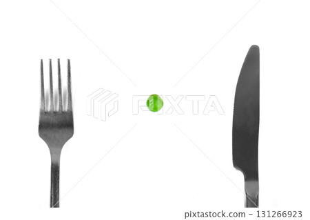 Pea meal with silver cutlery Pea meal with silver cutlery 131266923