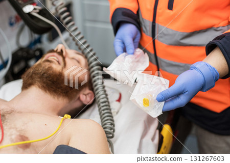 Close up of injured men in an Ambulance Close up of injured men in an Ambulance 131267603