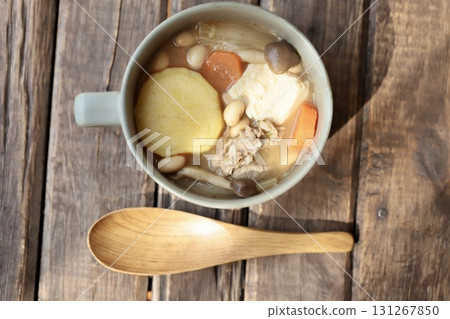 Pork miso soup with lots of sweet potatoes served in a soup cup Pork miso soup with lots of sweet potatoes served in a soup cup 131267850