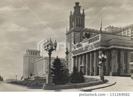 Moscow, Russia - July 22, 1953: The Moscow State University high-rise building on Lenin Hills. The main entrance. Retro postcard. Inscriptions in Russian. Moscow, Russia - July 22, 1953: The Moscow State University high-rise building on Lenin Hills. The main entrance. Retro postcard. Inscriptions in Russian. 131269082