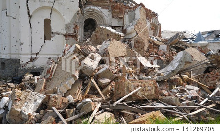 View to destroyed church at Kharkivska oblast. Ruined building after bomb attacks on ukrainian territory from russia army. Consequences of russian invasion of Ukraine. Slow motion 131269705