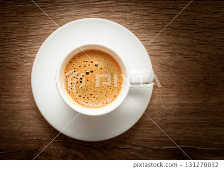 Top view of Turkish coffee with foam in cup 131270032