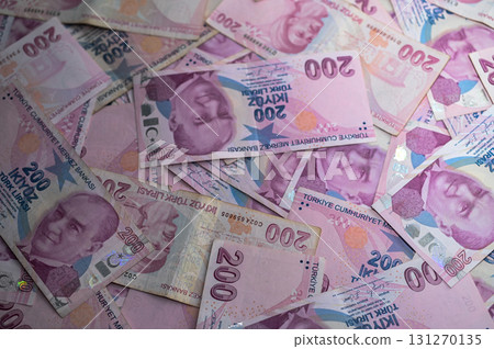 Stacks of colorful Turkish lira notes spread out on a table currency Stacks of colorful Turkish lira notes spread out on a table currency 131270135