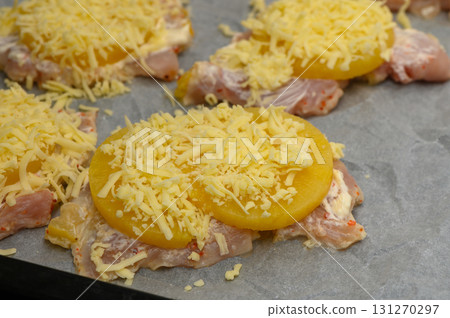 Juicy chicken breasts topped with pineapple and melted cheese ready 131270297