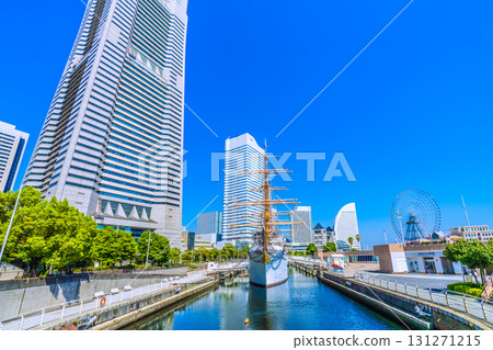 Yokohama cityscape in Japan, in front of Sakuragicho Station. Views of Yokohama Landmark Tower, Nippon Maru, Pacifico Yokohama, and more. Towards tomorrow 131271215