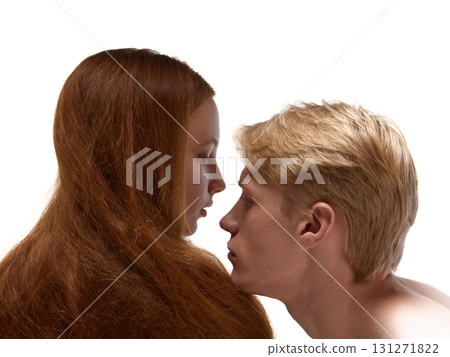 Couple facing each other with intense expressions and long red hair Couple facing each other with intense expressions and long red hair 131271822