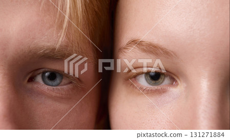 Extreme close up of male and female eyes with natural skin and clear detail Extreme close up of male and female eyes with natural skin and clear detail 131271884