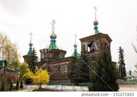 Karakol landmark, Holy Trinity Cathedral, Kyrgyzstan. Wooden church architecture Karakol landmark, Holy Trinity Cathedral, Kyrgyzstan. Wooden church architecture 131271920
