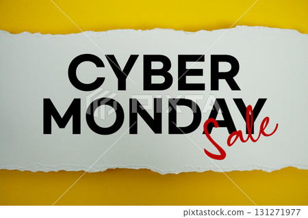 Cyber Monday text on white paper torn ripped horizontal on yellow background Cyber Monday text on white paper torn ripped horizontal on yellow background 131271977