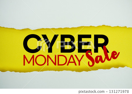 Cyber Monday text on yellow with white paper torn ripped of horizontal 131271978