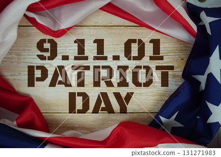 American flag with "911 Patriot Day" on wooden background American flag with "911 Patriot Day" on wooden background 131271983