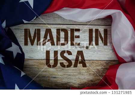 American flag with "Made in USA" on wooden background 131271985
