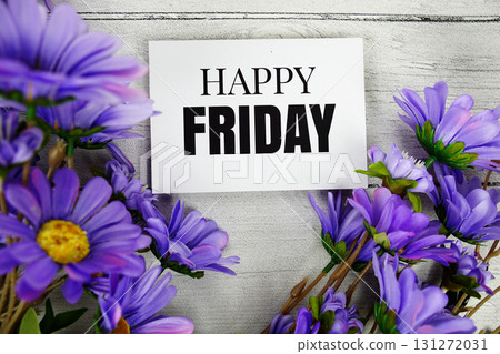 Happy Friday text with flowers decoration on wooden background 131272031