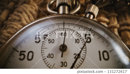 Macro Close Up Shot of Mechanical Stopwatch with Metallic Case and Clear Dial. Competitive Athletic Timing 131272617