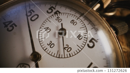 Macro Close Up Shot of Mechanical Stopwatch with Metallic Case and Clear Dial Macro Close Up Shot of Mechanical Stopwatch with Metallic Case and Clear Dial 131272626