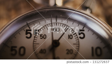 Time Lapse: Macro Close Up Shot of Mechanical Stopwatch with Metallic Case and Dial 131272637