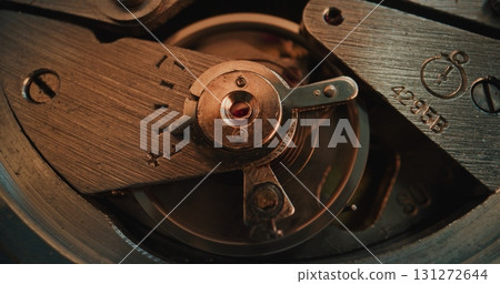 Macro Close Up Shot of Intricate Watch Mechanism. Detailed Look Into Clock Mechanical Engineering Macro Close Up Shot of Intricate Watch Mechanism. Detailed Look Into Clock Mechanical Engineering 131272644