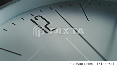 Time Lapse of Minimalist Wall Clock with Number 12 on the Dial and Running Second Hand Time Lapse of Minimalist Wall Clock with Number 12 on the Dial and Running Second Hand 131272681