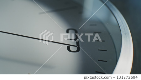 Macro Close Up Shot of Minimalist Wall Clock. Modern Design Element of Interior Macro Close Up Shot of Minimalist Wall Clock. Modern Design Element of Interior 131272694