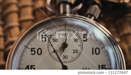 Macro Close Up Shot of Mechanical Stopwatch with Metallic Case and Clear Dial with Running Second Hand Macro Close Up Shot of Mechanical Stopwatch with Metallic Case and Clear Dial with Running Second Hand 131272697