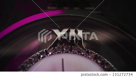 Close Up of Elegant Wristwatch with Gemstone Bezel and Metallic Bracelet Close Up of Elegant Wristwatch with Gemstone Bezel and Metallic Bracelet 131272734