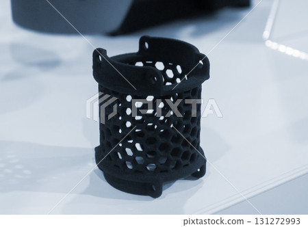 Object printed on 3D printer from molten plastic powder close-up. Model printed on 3D printer from melted polyamide powder. New modern additive 3D printing technology. Multi Jet Fusion MJF technology 131272993