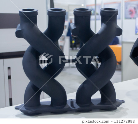 Object printed on 3D printer from molten plastic powder. Model black color printed on 3D printer from melted polyamide powder. Multi Jet Fusion MJF. Modern additive progressive 3D printing technology 131272998