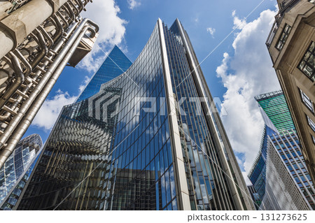 Modern Glass Skyscraper in Financial District with Reflections Modern Glass Skyscraper in Financial District with Reflections 131273625