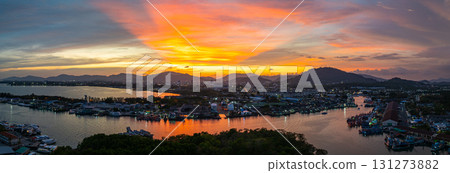 Aerial view of amazing colorful sky of sunset over the Fishing port 131273882