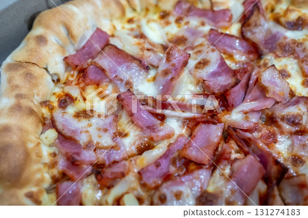 Close up of bacon and cheese pizza 131274183