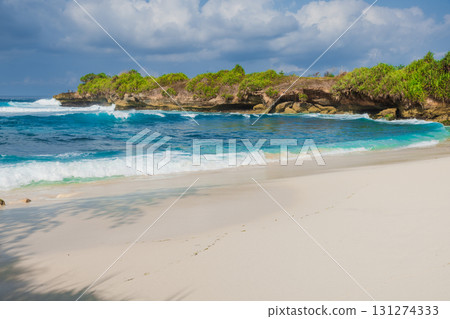 Tropical beach with blue ocean in Lembongan, Indonesia Tropical beach with blue ocean in Lembongan, Indonesia 131274333