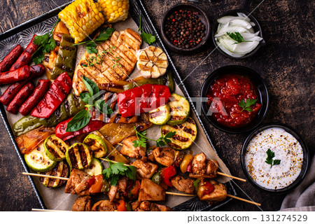 Assortment of grilled bbq meat and vegetables Assortment of grilled bbq meat and vegetables 131274529