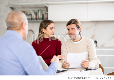 Agent making offer to couple 131275733