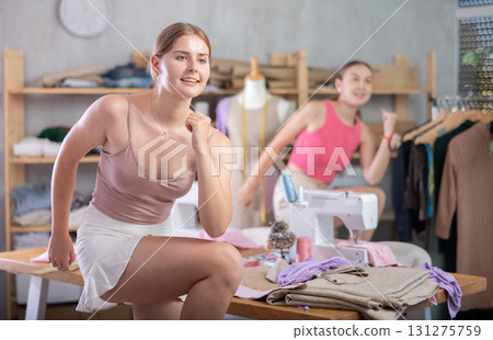 Dressmakers warming up together during a break 131275759