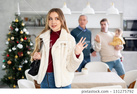 Two men quarreling with young woman 131275792