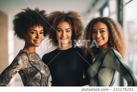 Three joyful women with fabulous afros radiate confidence and sisterhood in a sunlit room 131276291