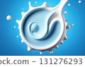 Energetic splash of milk in vibrant blue background. Perfect for creative projects 131276293