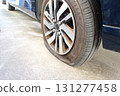 Punctured tire 131277458