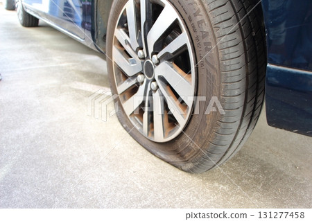 Punctured tire 131277458