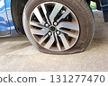 Punctured tire 131277470