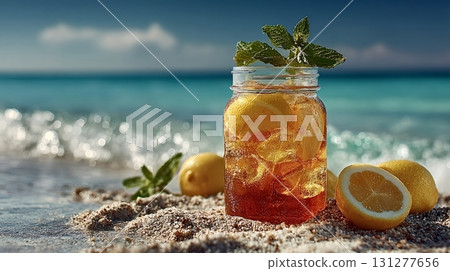 Refreshing iced tea with lemon and mint on tropical beach 131277656