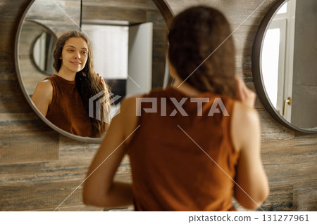 Experience a Reflective Morning Routine that Takes Place in a Beautiful Modern Bathroom 131277961