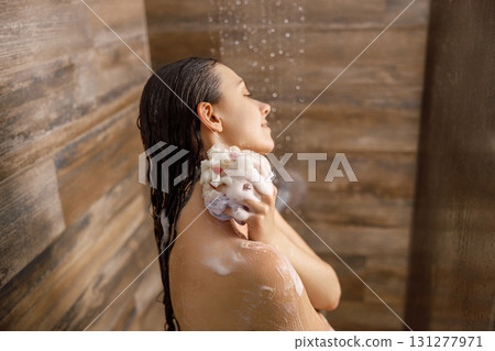 Enjoying a Refreshing and Invigorating Shower Experience with Soap and Clean Water Enjoying a Refreshing and Invigorating Shower Experience with Soap and Clean Water 131277971
