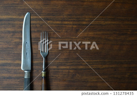 Antique fork and knife cutlery 131278435