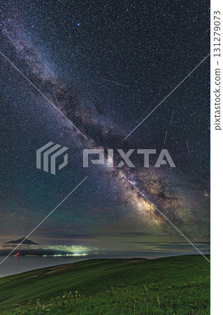 Mount Rishiri and the magnificent Milky Way floating in the starry sky 131279073